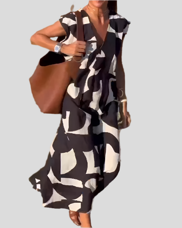 Sita | Dress with print and V-neckline