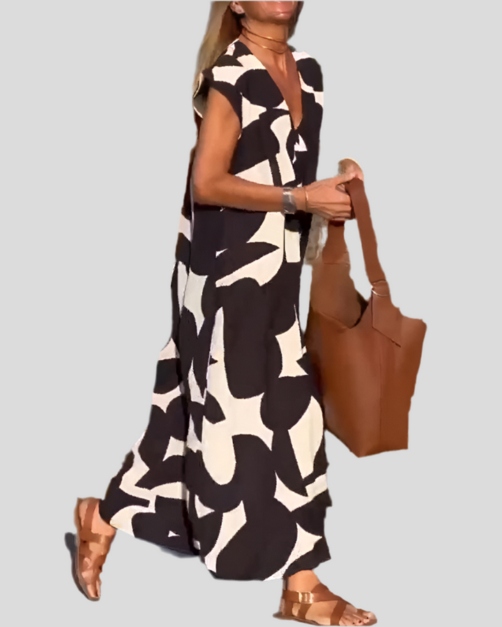 Sita | Dress with print and V-neckline