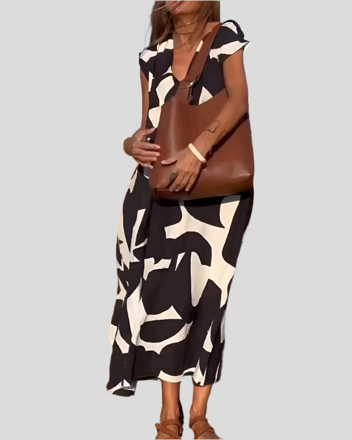 Sita | Dress with print and V-neckline