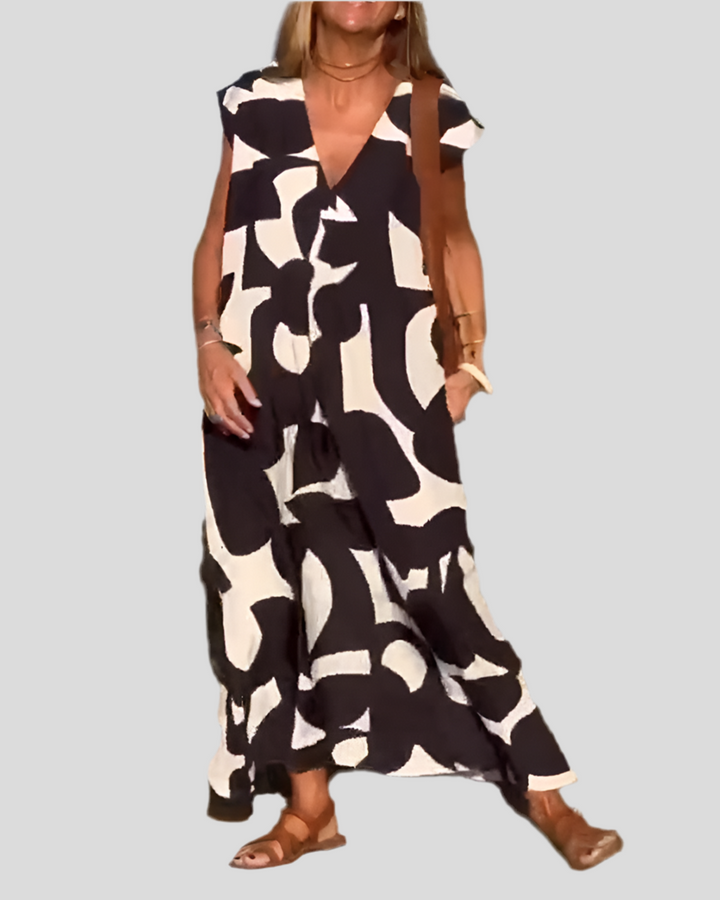 Sita | Dress with print and V-neckline
